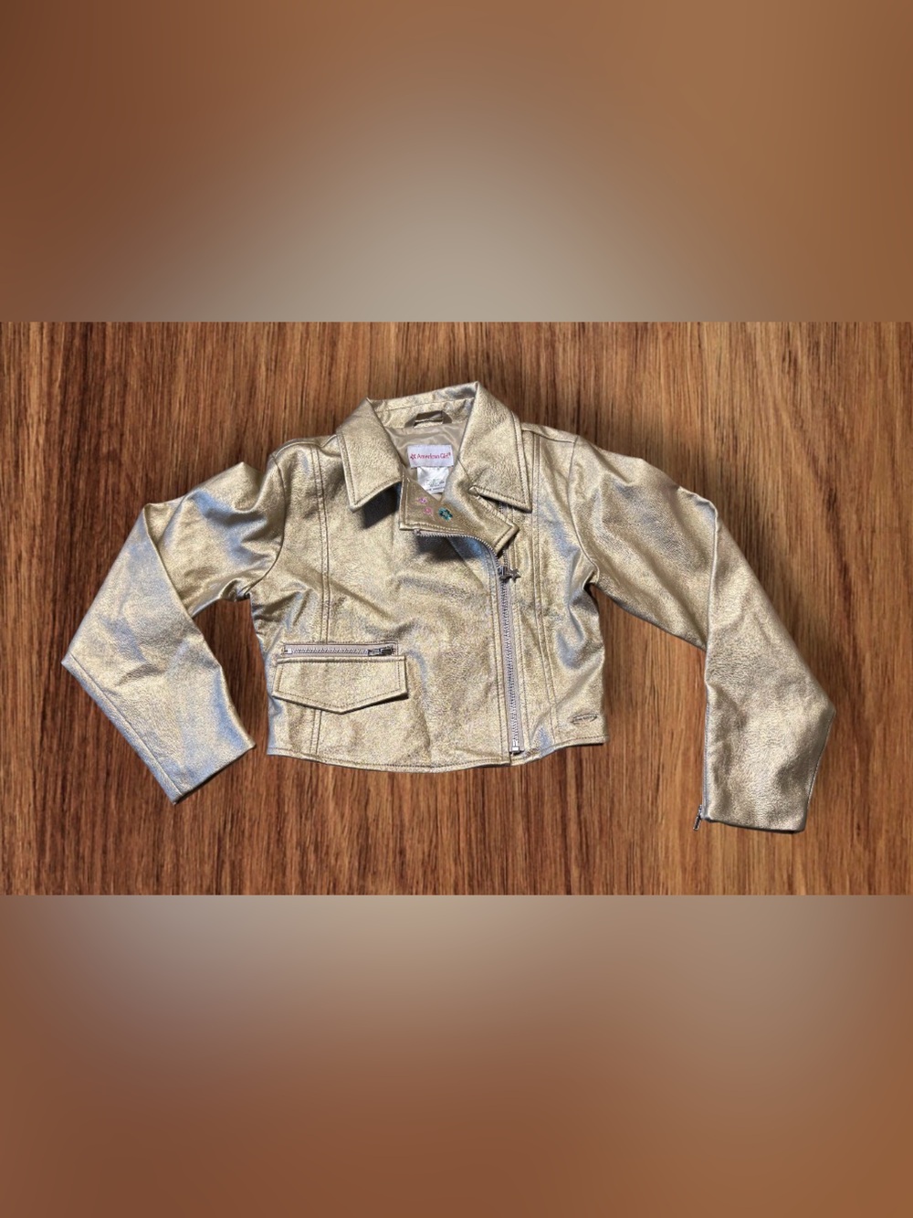 American Girl Gold Moto Jacket featuring a metallic gold faux-leather finish